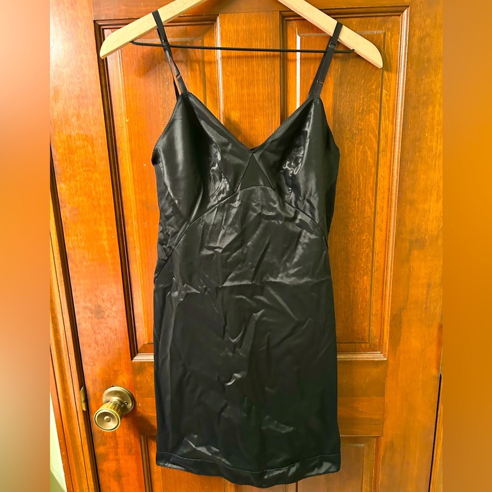 VTG Black nylon full length slip. Size and brand tag were removed.